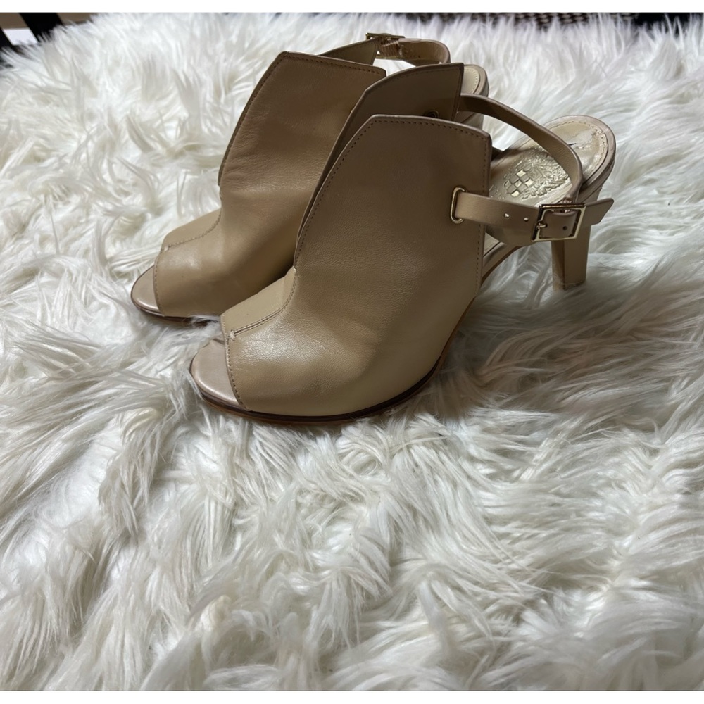 Vince Camuto Beige leather sling back heels with front slits. Very Versatile.
